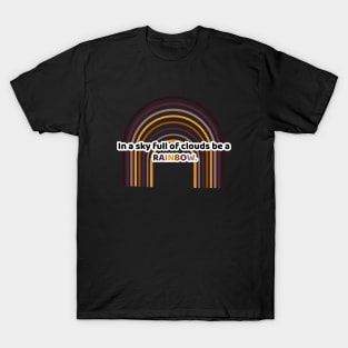 in a sky full of clouds be a rainbow. T-Shirt